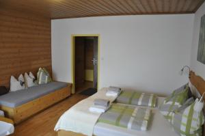 Postel nebo postele na pokoji v ubytování Haus Voithofer