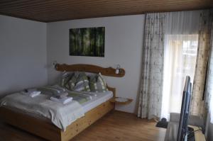 Postel nebo postele na pokoji v ubytování Haus Voithofer