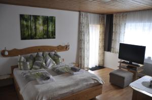 Postel nebo postele na pokoji v ubytování Haus Voithofer