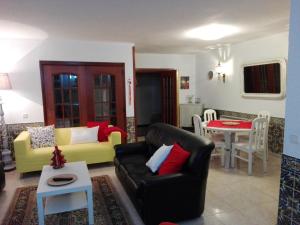 Uma área de estar em Villa Benedito