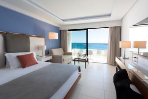 Un ou plusieurs lits dans un hébergement de l'établissement Alimounda Mare Hotel