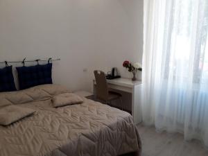 Postel nebo postele na pokoji v ubytování Rosa del Salento