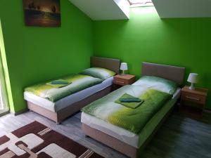 Posteľ alebo postele v izbe v ubytovaní Ubytovanie House
