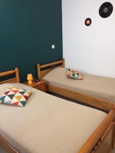 Кровать или кровати в номере chambres de la Nonette