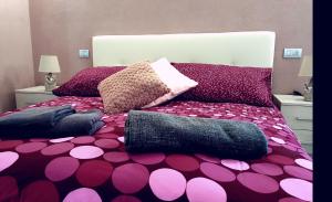 A bed or beds in a room at Cuorematto