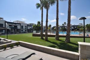 The swimming pool at or close to Oasis Beach VI South facing pool view La Zenia