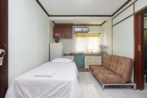 Postel nebo postele na pokoji v ubytování Amarin Inn + 84 fotografií