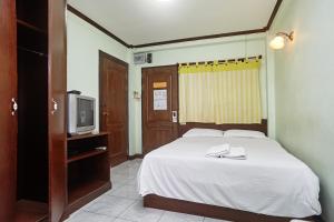 TV a/nebo společenská místnost v ubytování Amarin Inn