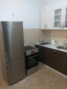 Virtuvė arba virtuvėlė apgyvendinimo įstaigoje Apartment MA
