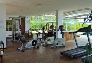 a gym with a bunch of exercise equipment in it at Aguas del Monte Hotel SPA in San Miguel del Monte