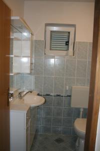 Koupelna v ubytování APARTMANI LIDIJA VINIŠČE