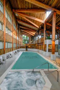a large indoor swimming pool in a building at Lake Louise Inn in Lake Louise