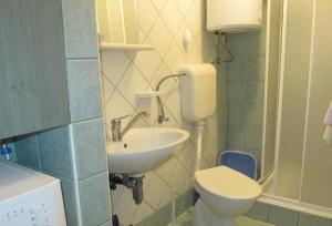 Koupelna v ubytování Apartment Mira