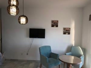 Et tv og/eller underholdning på Balcon Del Mar Primera Linea de Playa