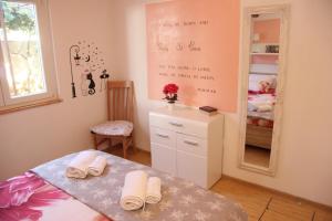 Łóżko lub łóżka w pokoju w obiekcie Vacation house "Viola"