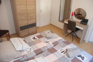 Łóżko lub łóżka w pokoju w obiekcie Vacation house "Viola"