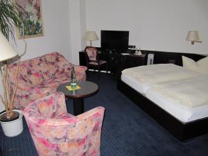 Postel nebo postele na pokoji v ubytování Hotel Wettin