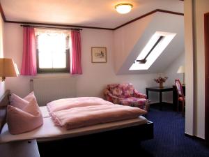 Postel nebo postele na pokoji v ubytování Hotel Wettin