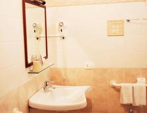 Koupelna v ubytování Greta Rooms Hotel