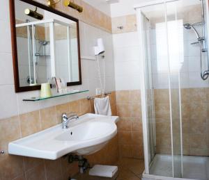 Koupelna v ubytování Greta Rooms Hotel