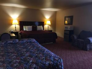 Cama o camas de una habitación en Camino Real Hotel