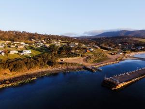 an aerial view of a small island in the water at Manfield Seaside Bruny Island in Alonnah