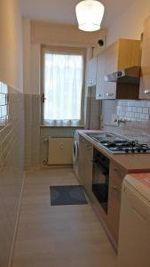 Η κουζίνα ή μικρή κουζίνα στο Appartamento Lucky +9 φωτογραφίες