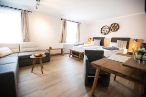 Rúm í herbergi á Hotel Moserwirt