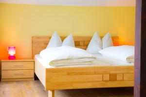 Rúm í herbergi á Hotel Moserwirt