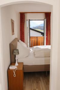 Posteľ alebo postele v izbe v ubytovaní Hotel Sonnenhof - bed & breakfast & appartements