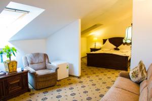 Tempat tidur dalam kamar di Hotel-Pensiunea Zefir