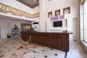 TV a/nebo společenská místnost v ubytování رؤوم إن للشقق المخدومة-Raoum Inn Serviced Apartments