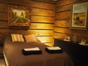 Postel nebo postele na pokoji v ubytování Inari Juutua
