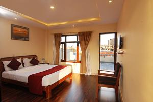 Krevet ili kreveti u jedinici u okviru objekta Thamel Grand Hotel