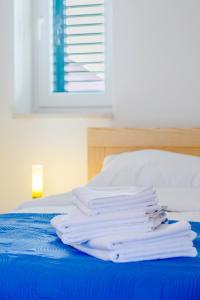 Ein Bett oder Betten in einem Zimmer der Unterkunft Vila Mimoza