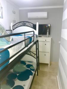 A bed or beds in a room at Selena Luxury Monte Carrera