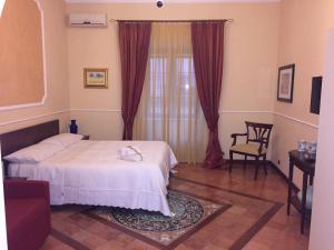 Voodi või voodid majutusasutuse B&B Lumasa toas