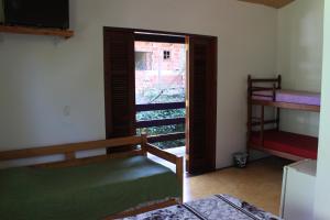 Postel nebo postele na pokoji v ubytování Pousada O Canto das Sereias