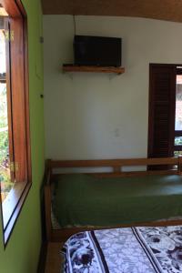 Postel nebo postele na pokoji v ubytování Pousada O Canto das Sereias
