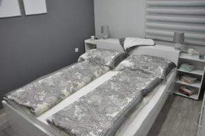 Lova arba lovos apgyvendinimo įstaigoje Aria lux apartmani
