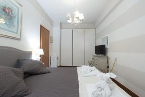 A bed or beds in a room at Holidays Banchi Nuovi
