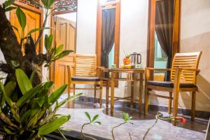 Posezení v ubytování Dijumahrai Homestay