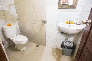 Koupelna v ubytování Dijumahrai Homestay