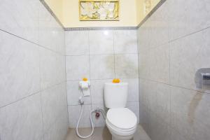 Phòng tắm tại Dijumahrai Homestay