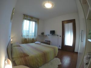 Posteľ alebo postele v izbe v ubytovaní Villa C&C