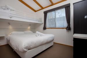 Katil atau katil-katil dalam bilik di Portland Tourist Park