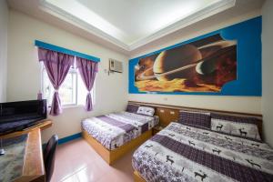 Voodi või voodid majutusasutuse Blue Sea Romance B&B toas