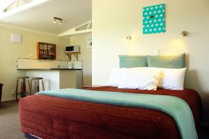 Postel nebo postele na pokoji v ubytování Te Awa Motel