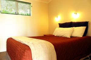 Postel nebo postele na pokoji v ubytování Te Awa Motel