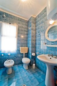 Vonios kambarys apgyvendinimo įstaigoje Ciao Caorle Appartamenti